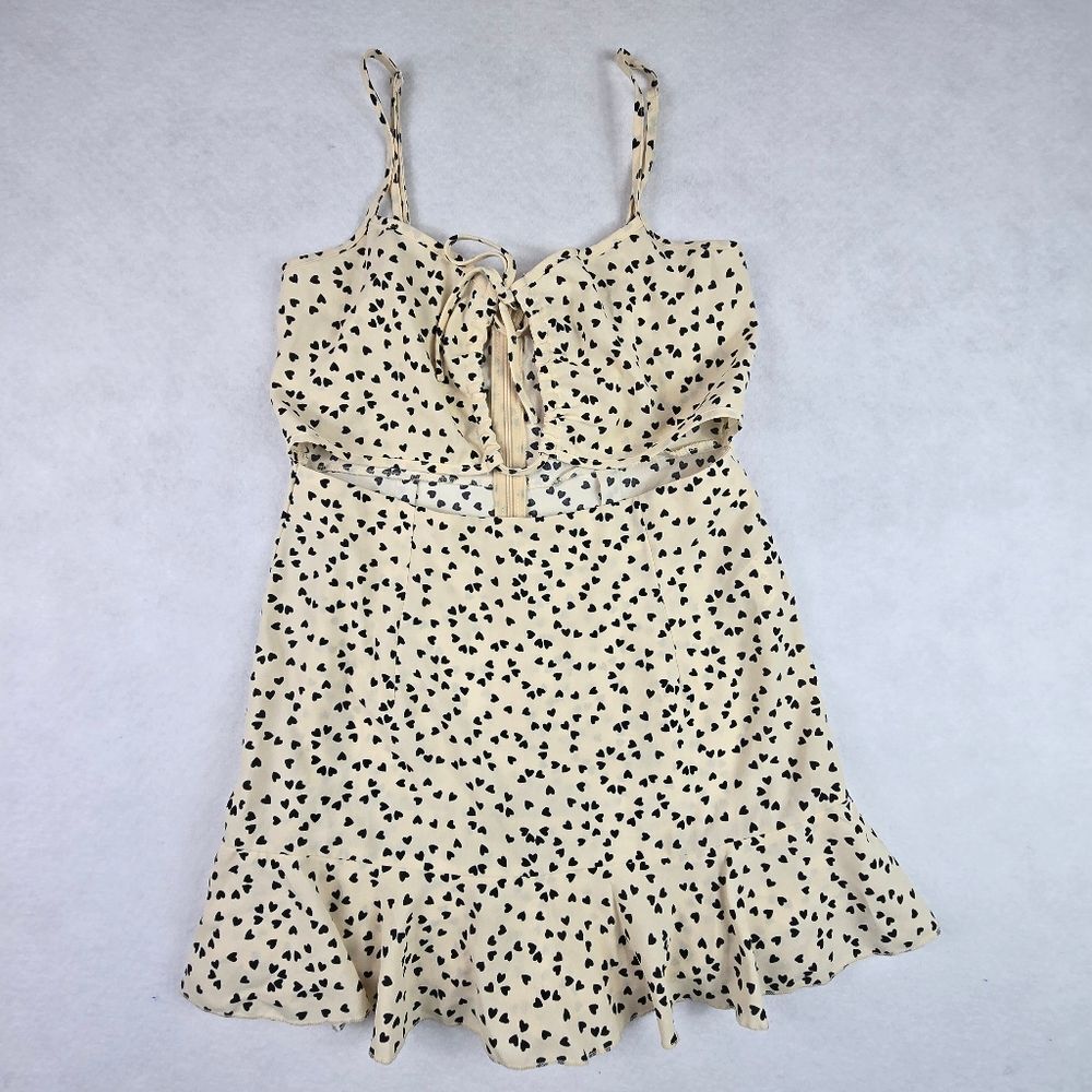 SHEIN Vcay Heart Print Tie Front Cut Out Ruffle Romper